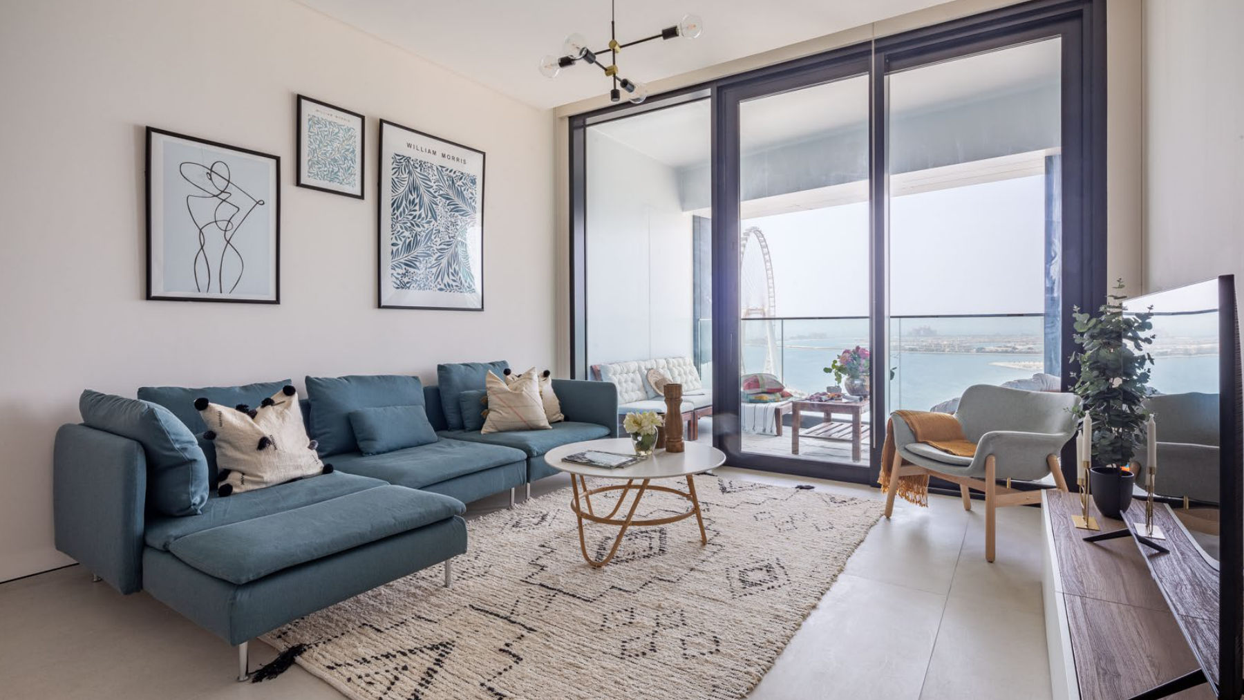 Living room with a blue sectional sofa
